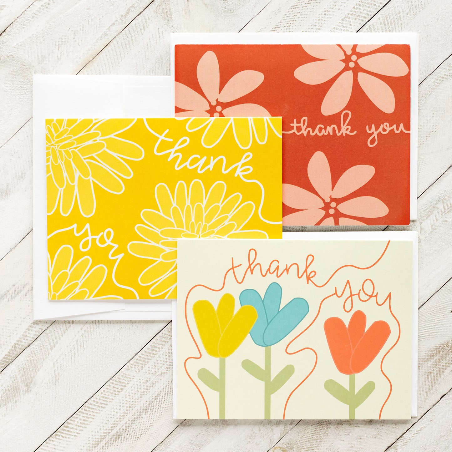 Trio of overscaled floral thank you cards in bright colors